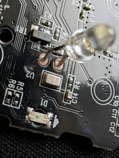 Onn 4K Plus Streaming Remote microphone location just  below the LED lightt