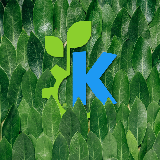 The KDE logo peeks out from behind some very lusciously green leaves.