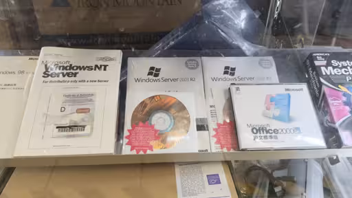 Store displaying very old Windows software installation discs Store displaying very old Windows software installation discs